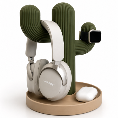 Suporte em formato de cacto verde com auscultadores Bose, relógio e estojo branco na base