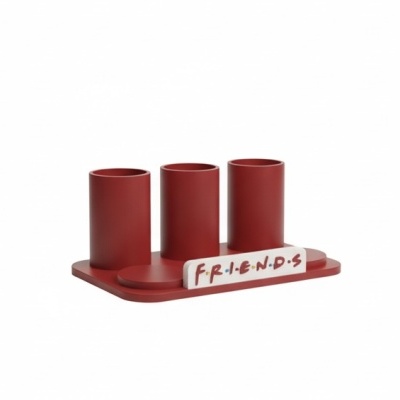 Suporte organizador vermelho com três cilindros e placa FRIENDS