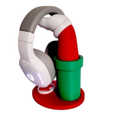 Suporte para auscultadores com tema Super Mario com auscultadores brancos e cinzentos
