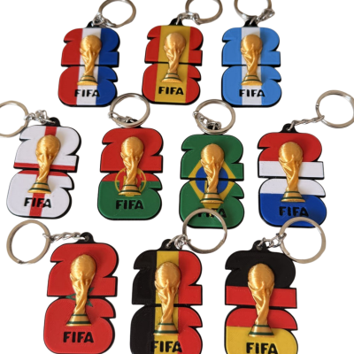 Porta-chaves FIFA com troféu dourado e bandeiras de países diferentes