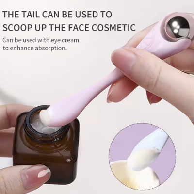 Dispositivo rosa para aplicação de creme facial com esfera metálica e ponta para o creme