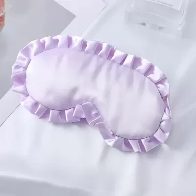 Máscara de dormir rosa claro em cetim com borda franzida