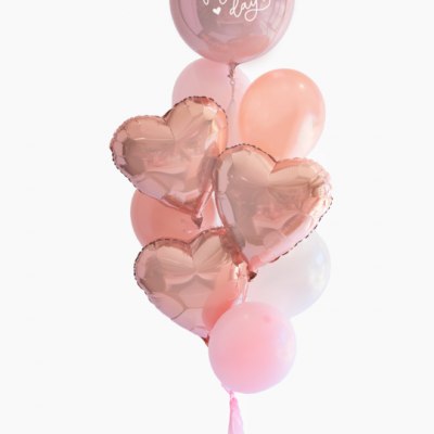 Conjunto de balões rosa e dourados com balão decorativo com texto 'HAPPY Valentine's day'