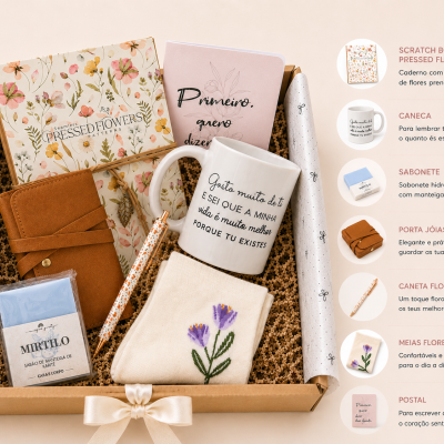 Caixa de presente com produtos florais e texto em português dispostos em embalagem com laço