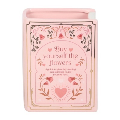 Vaso quadrado rosa com decoração floral e texto inspirador