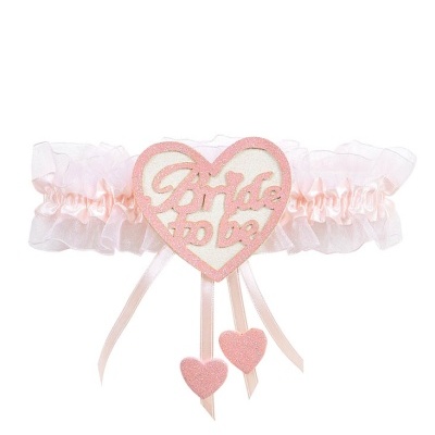 Liga de noiva cor-de-rosa com decoração de coração e fitas