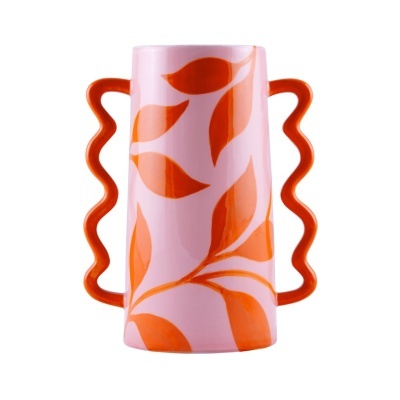 Vaso cerâmico rosa com folhas laranja e alças onduladas laranja