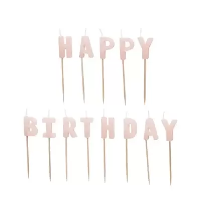 Velas em forma de letras cor-de-rosa com os dizeres HAPPY BIRTHDAY em palitos de madeira