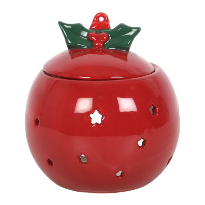 Pote vermelho em cerâmica com recortes em forma de estrelas e tampa decorativa verde e vermelha