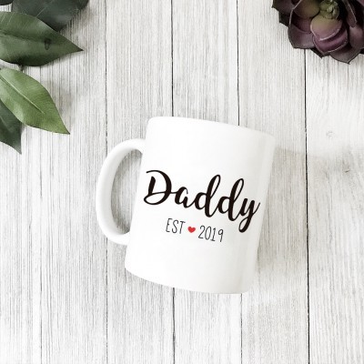 Caneca branca com texto 