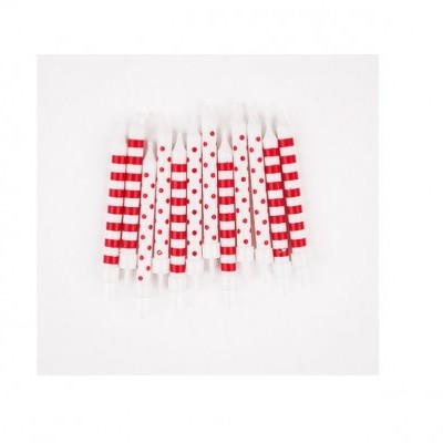 Velas de aniversário vermelhas e brancas com padrões de riscas e bolinhas