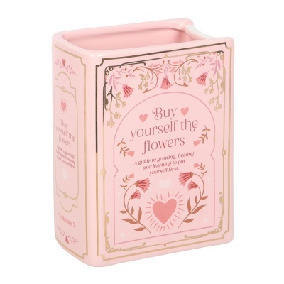 Vaso cerâmico rosa com flores e texto decorativo em inglês