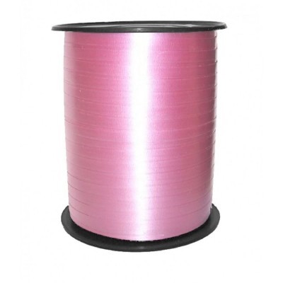 Rolo de fita rosa em carretel preto