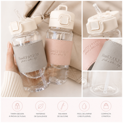 Garrafas de água transparentes com tampas brancas e capas de couro sintético rosa e cinza