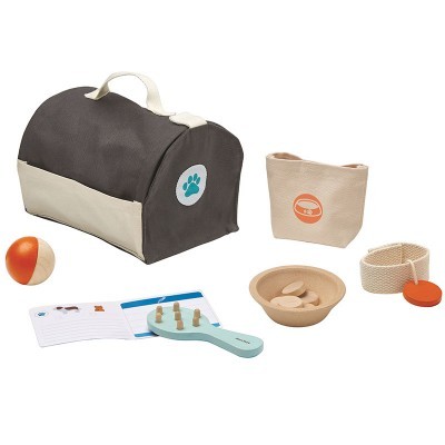 conjunto de brinquedos para animais com bolsa, bola, saco, prato de madeira, faixa e cartão com instruções