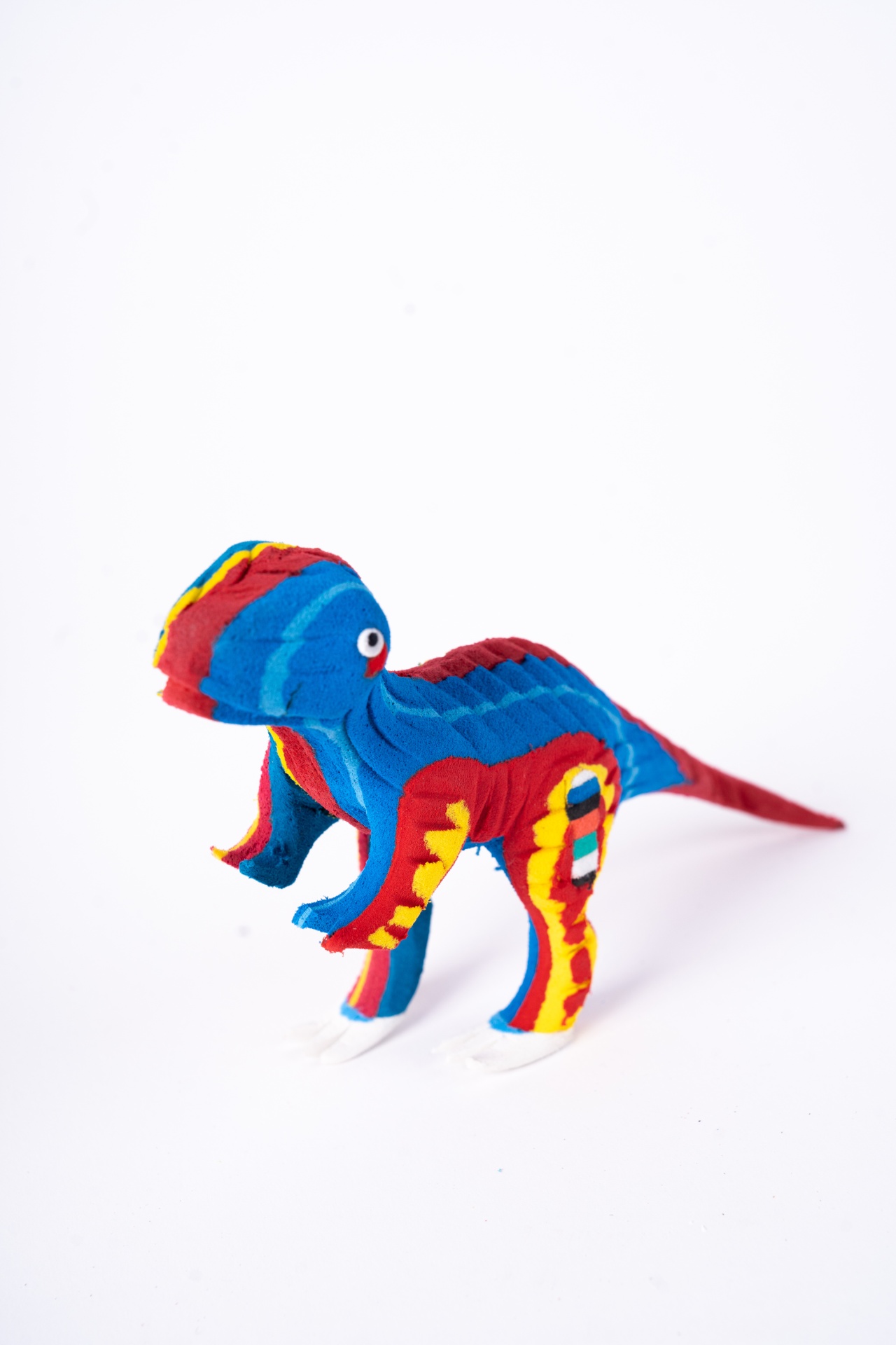 Dinossauro S Boneco de dinossauro de tecido colorido com padrões vibrantes