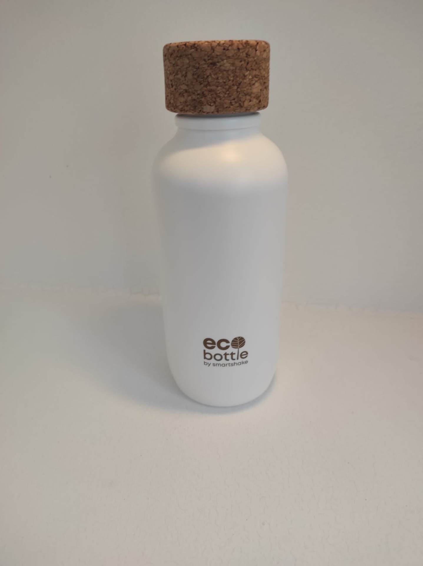 Garrafas EcoBottles 650ml Garrafa ecológica branca com tampa de cortiça e texto impresso na frente