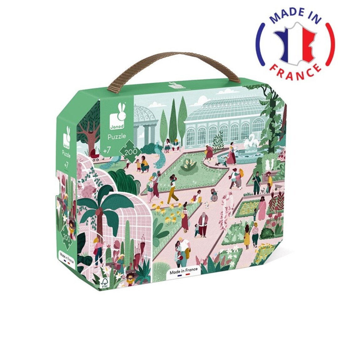 Caixa verde de puzzle Janod com alça castanha e ilustração de jardim e pessoas