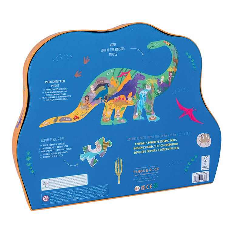 Caixa azul de puzzle com ilustração de dinossauro e texto em inglês