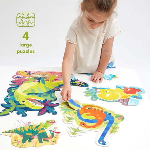 Menina a montar puzzles grandes de dinossauros coloridos