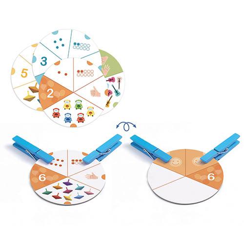 Discos coloridos educativos com segmentos numerados e pregadores de roupa azuis.