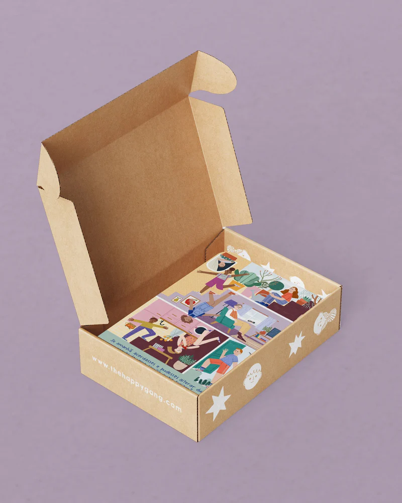 Caixa de cartão reciclado aberta mostrando produto ilustrado colorido