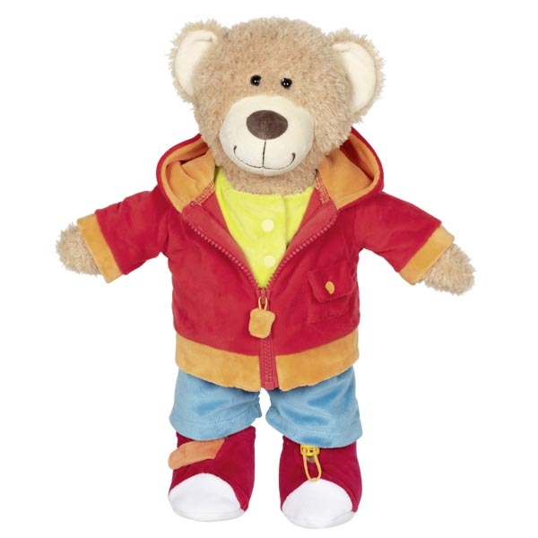 Ursinho de pelúcia vestido com roupas coloridas