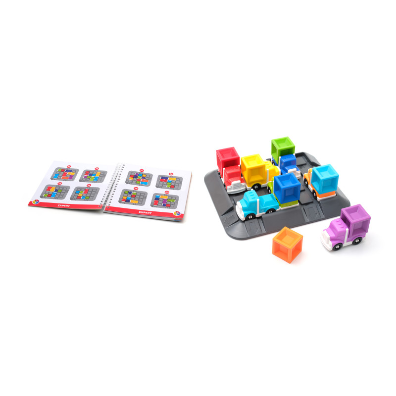 Jogo infantil de camiões coloridos com cubos e livro de instruções aberto