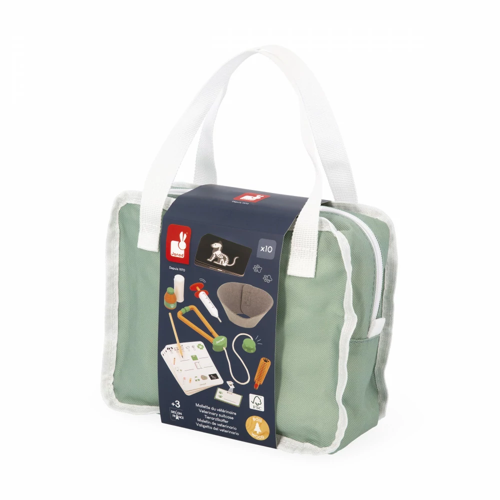 Bolsa verde com alças brancas e embalagem com conjunto veterinário infantil.
