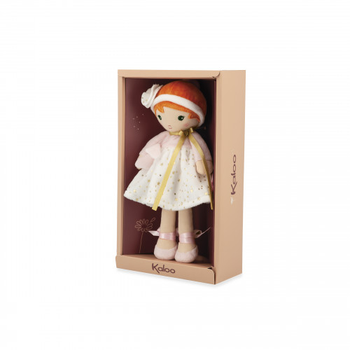 Boneca de tecido em caixa castanha com texto Kaloo