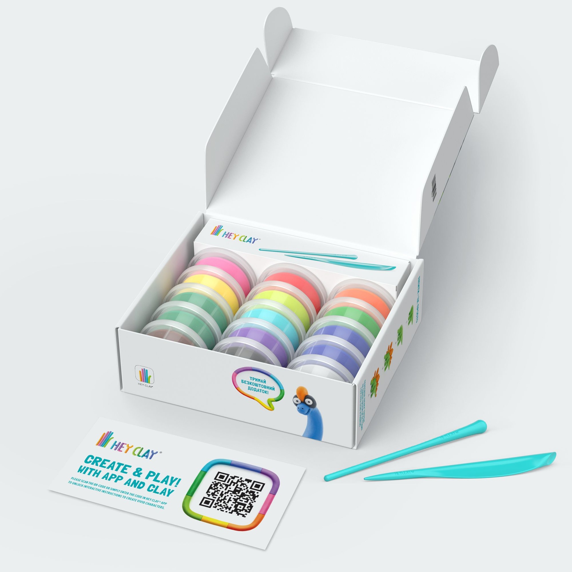 Conjunto de modelagem colorido com potes e ferramentas em caixa branca