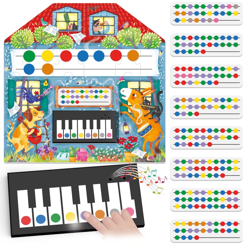 Piano musical infantil com teclas coloridas e padrões de notas em tiras de papel com vacas a tocar instrumentos