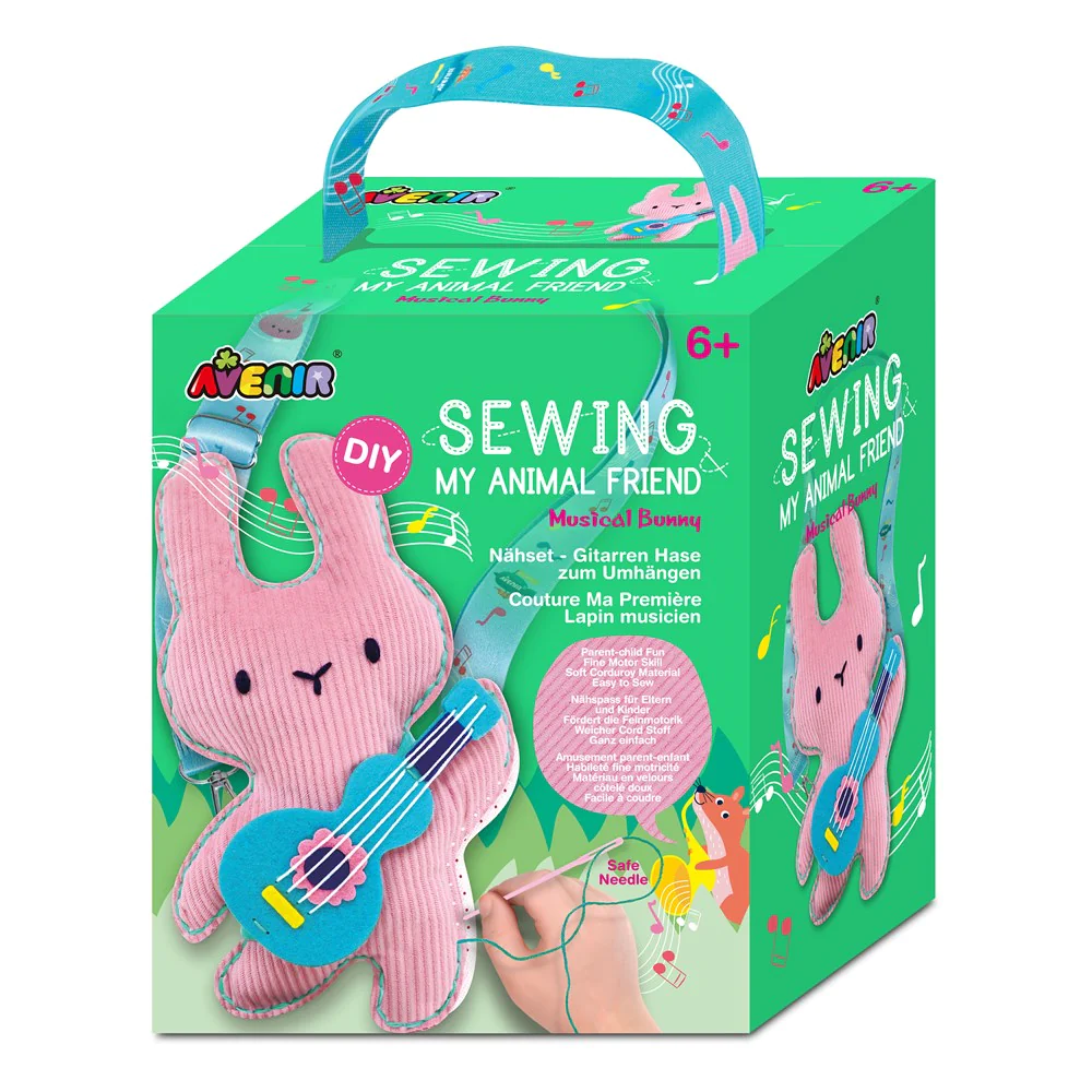 Caixa verde de kit de costura com brinquedo coelho rosa e guitarra azul para crianças
