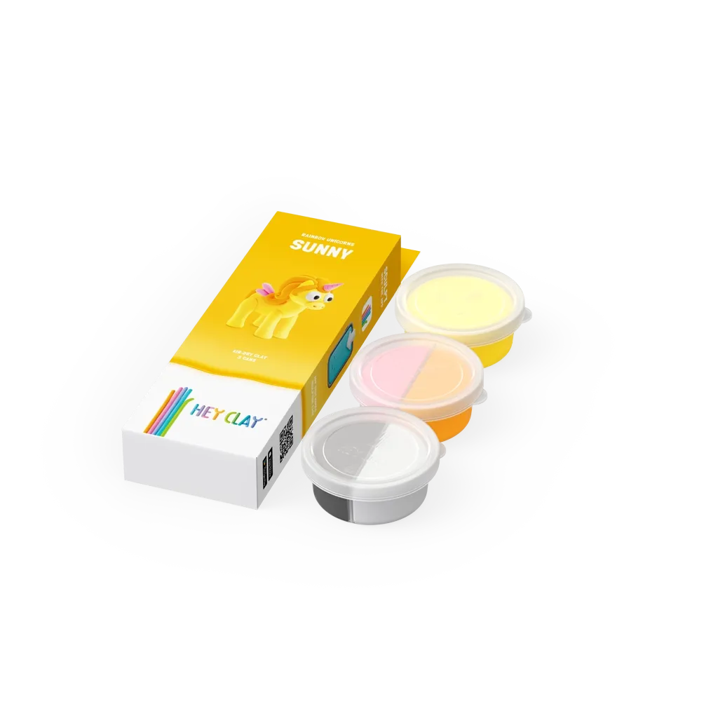 Conjunto de massa de modelar air-dry com embalagem amarela com um unicórnio e recipiente transparente com massa colorida