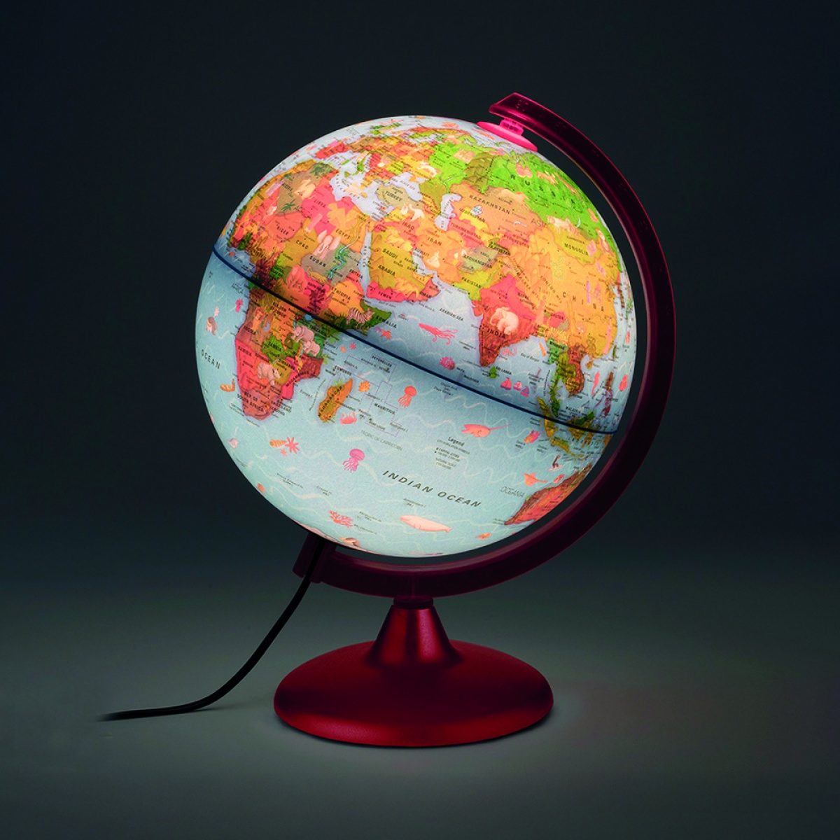 Globo terrestre iluminado com base vermelha