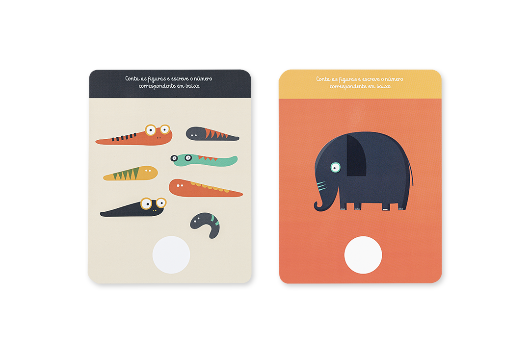 Duas cartas de jogo com ilustrações de cenouras e um elefante, textos em português no topo