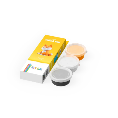 Kit com potes de massa moldável e embalagem com desenho de Shiba Inu.