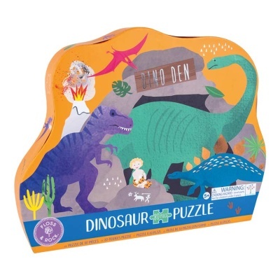 Caixa de puzzle colorido com ilustrações de dinossauros e menino