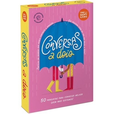 Embalagem colorida de jogo 'Conversas a dois' com design de chapéu de chuva azul e pernas coloridas.