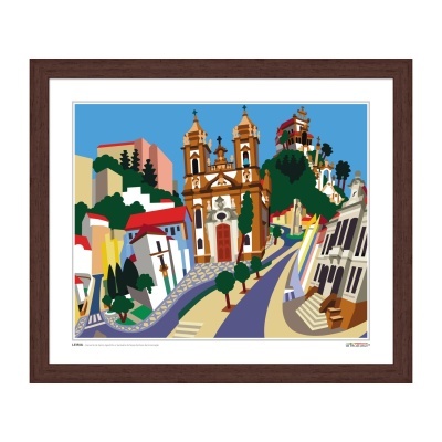 Quadro colorido de cidade com igreja e casas, moldura castanha