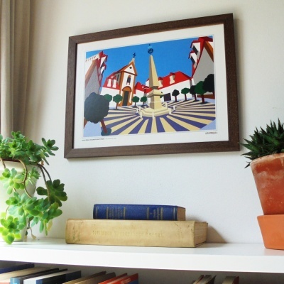 Quadro ilustrativo com monumento e edifícios, estante com livros e plantas