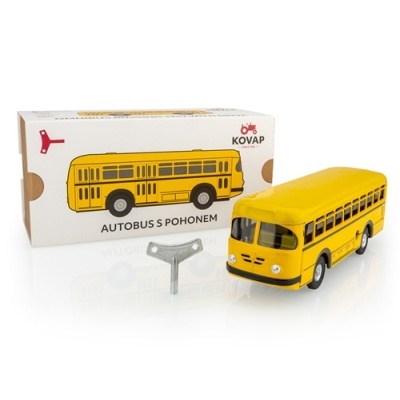 Miniatura de autocarro amarelo com chave de corda e caixa ilustrada