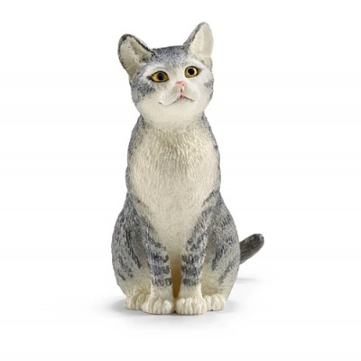 Estatueta de gato cinzento e branco sentado