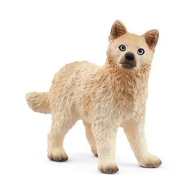 Figurina de cachorro castanho claro e escuro com olhos azuis