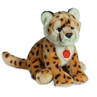 Pelúcia de leopardo com pelo castanho e manchas escuras