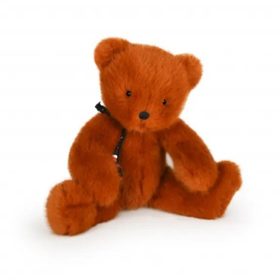 Ursinho de peluche castanho avermelhado sentado