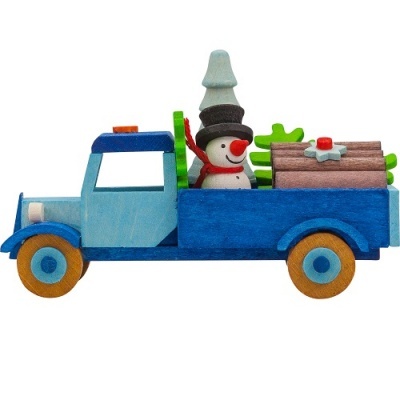 Camião de madeira azul com boneco de neve e árvores no compartimento de carga
