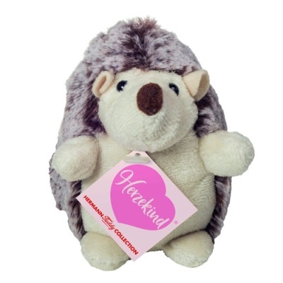 Pelúcia ouriço cinzento e branco com etiqueta rosa