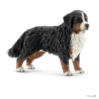 Figura de cão são Bernardo preto, branco e castanho sobre fundo branco
