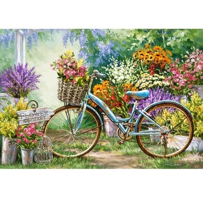 Bicicleta azul com cesto de flores, várias flores coloridas em vasos e placa 'FLOWER GARDEN'